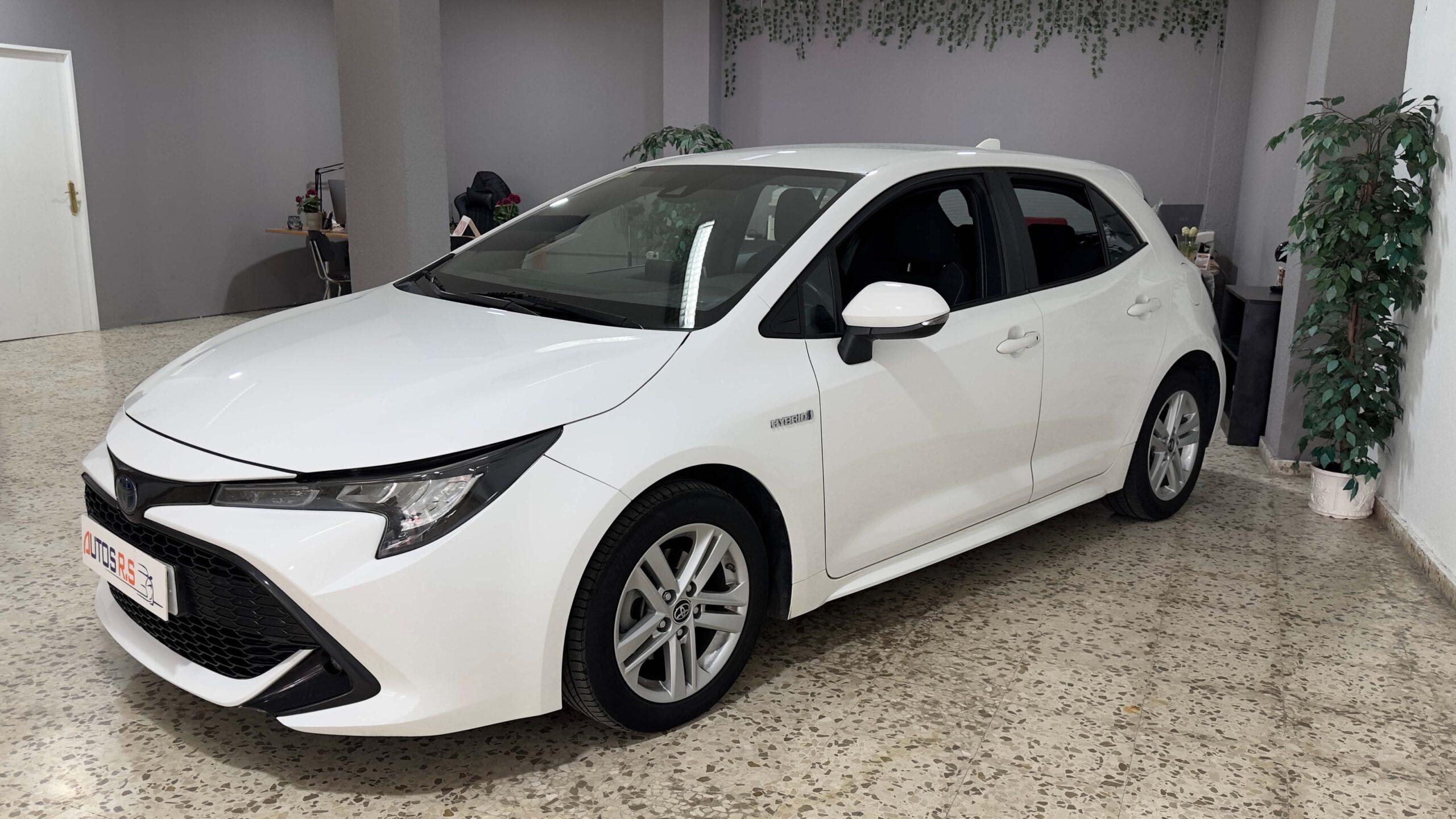 The headlights and the hood of a black luxury car