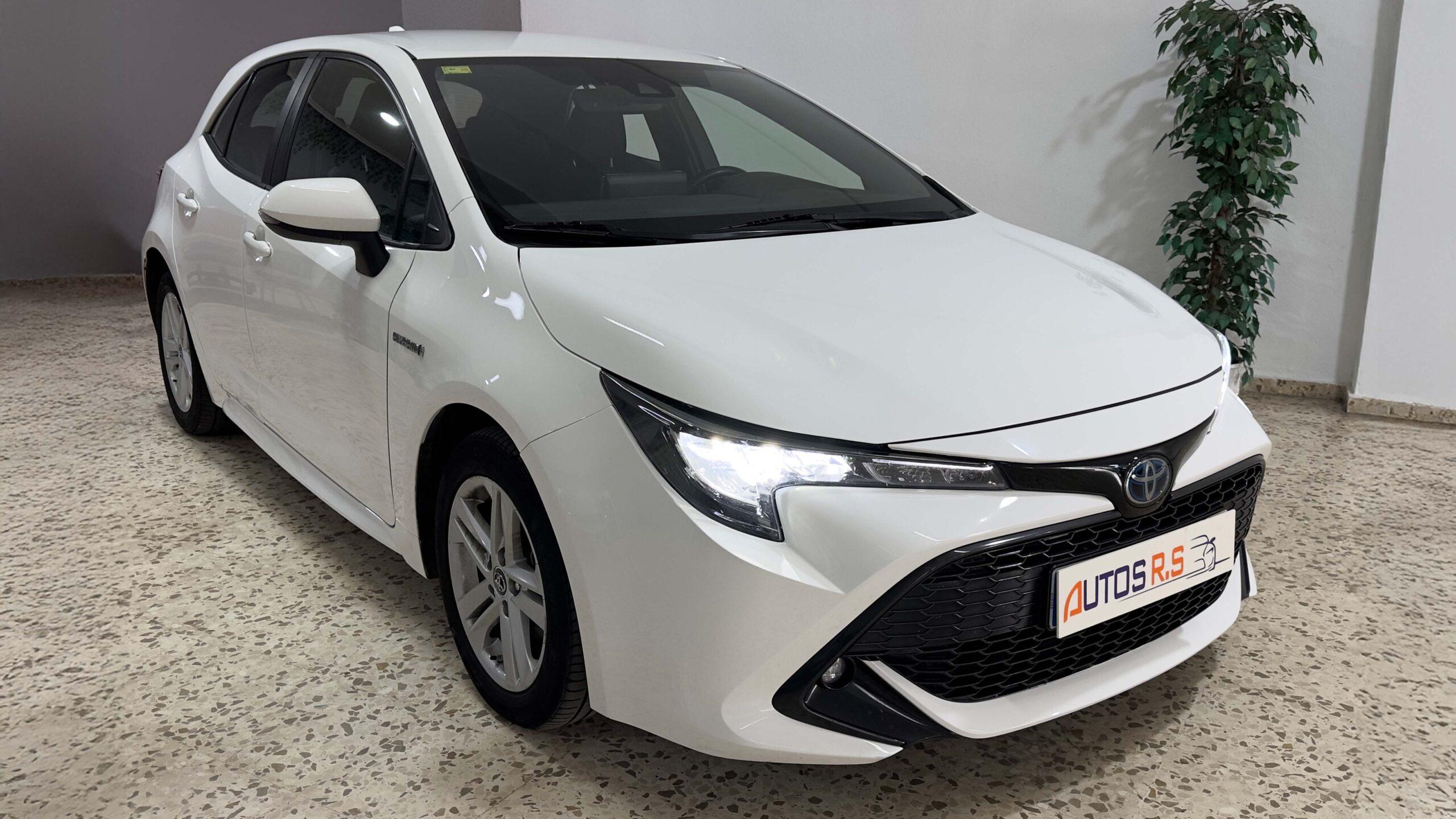 The headlights and the hood of a black luxury car