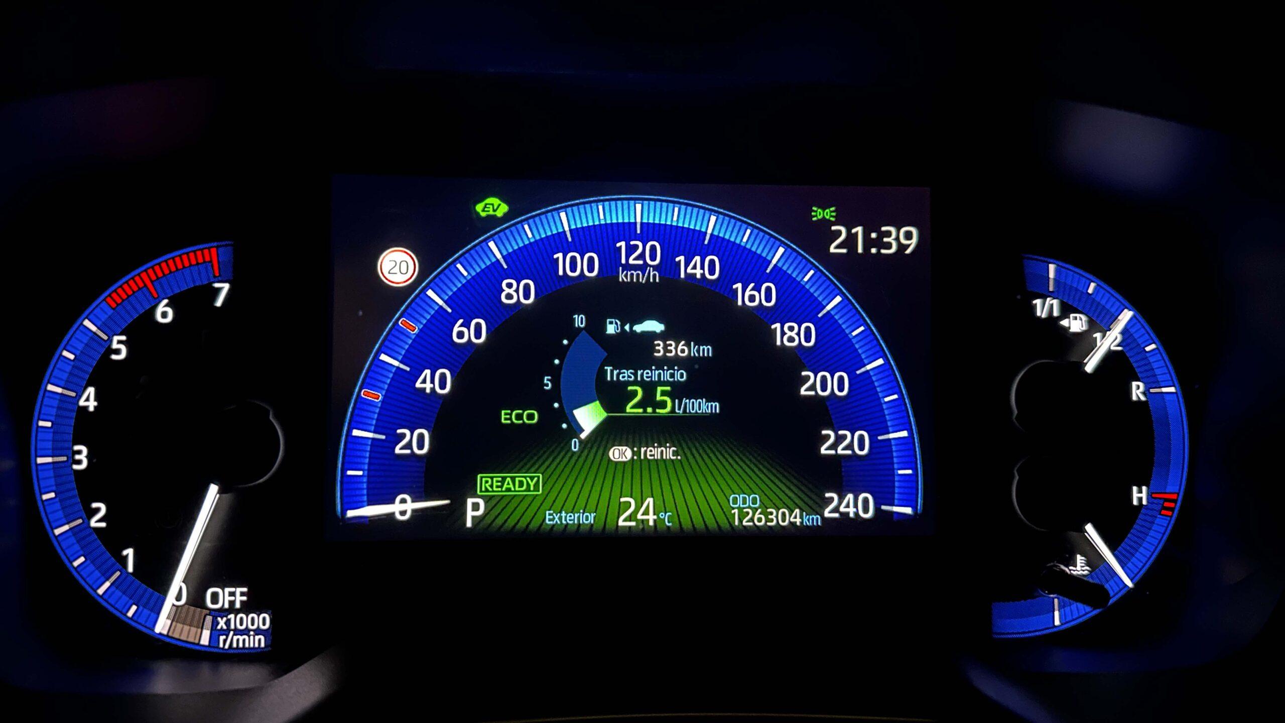 The headlights and the hood of a black luxury car